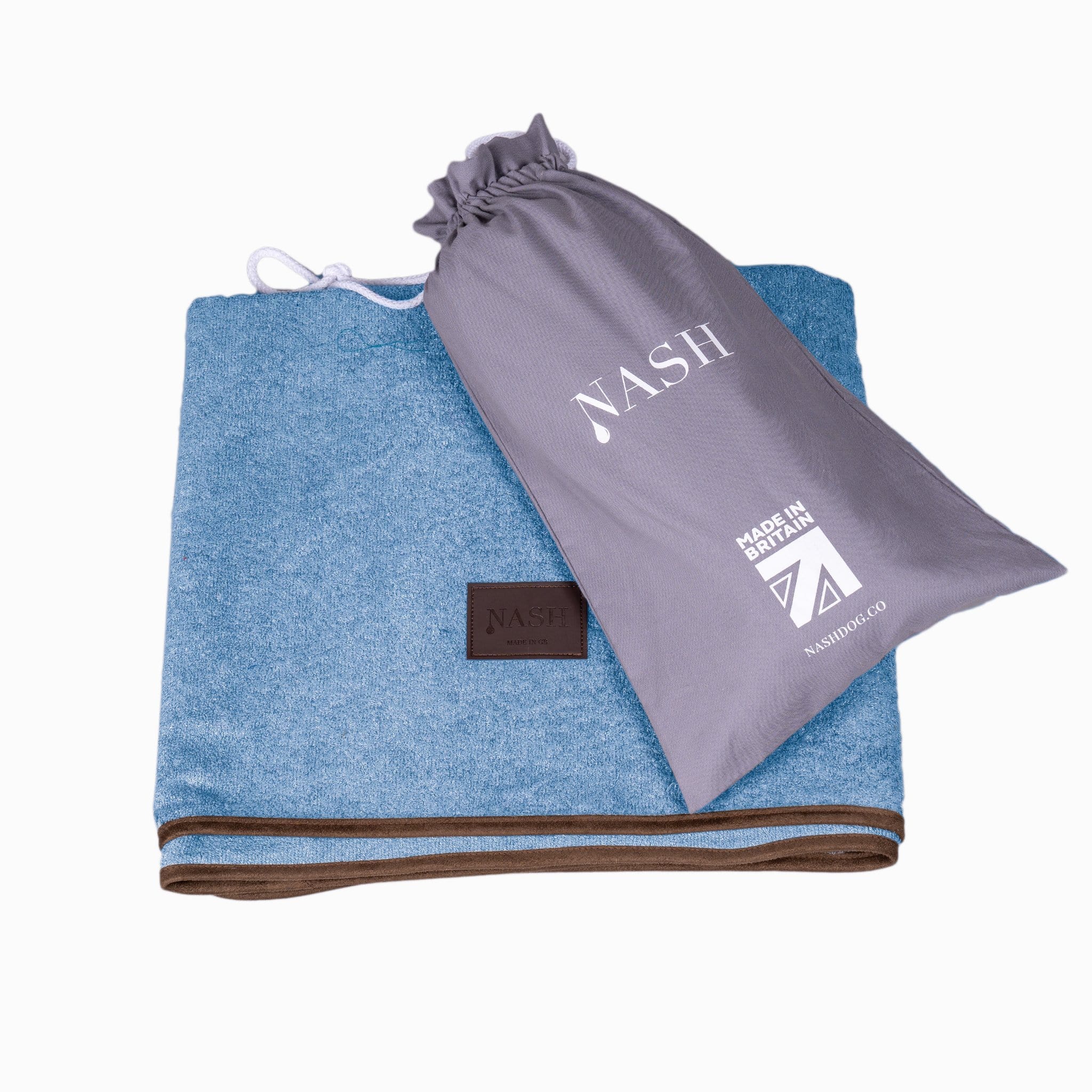 The NASH bamboo dog throw in Cambridge blue, and its reusable bag.