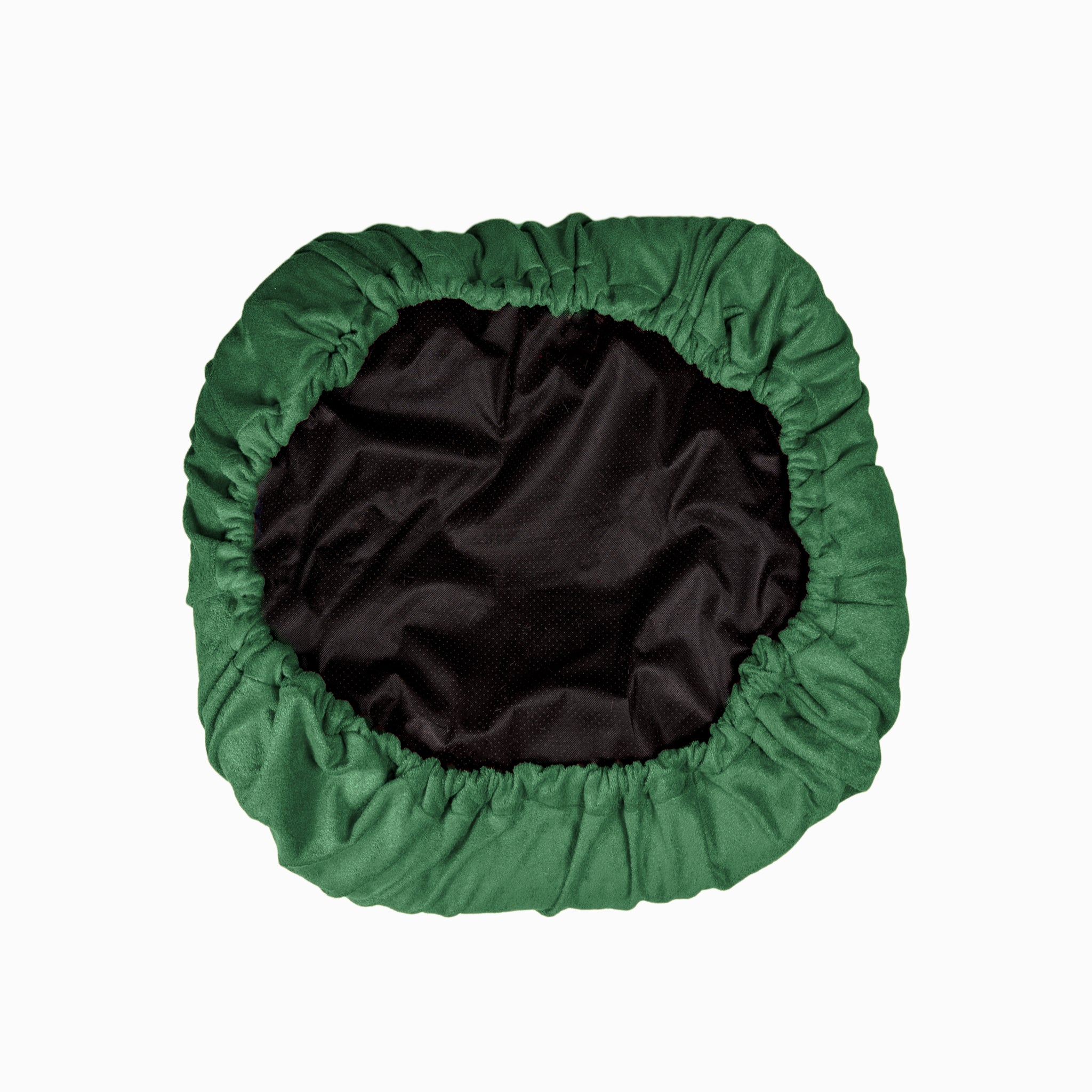 The underside of a NASH bamboo dog bed cover in forest green. 
